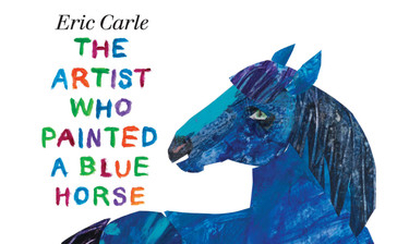 Book cover for "The Artist Who Painting A Horse Blue" by Eric Carle. It has a white background with an illustration of a blue horse. The book title is in multiple colors and the author's name is in black.