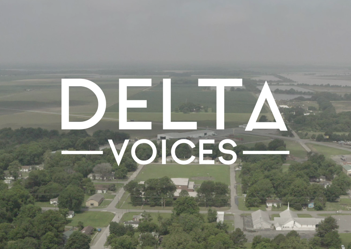 A white Delta Voices logo on top of an aerial photo of the Mississippi Delta.
