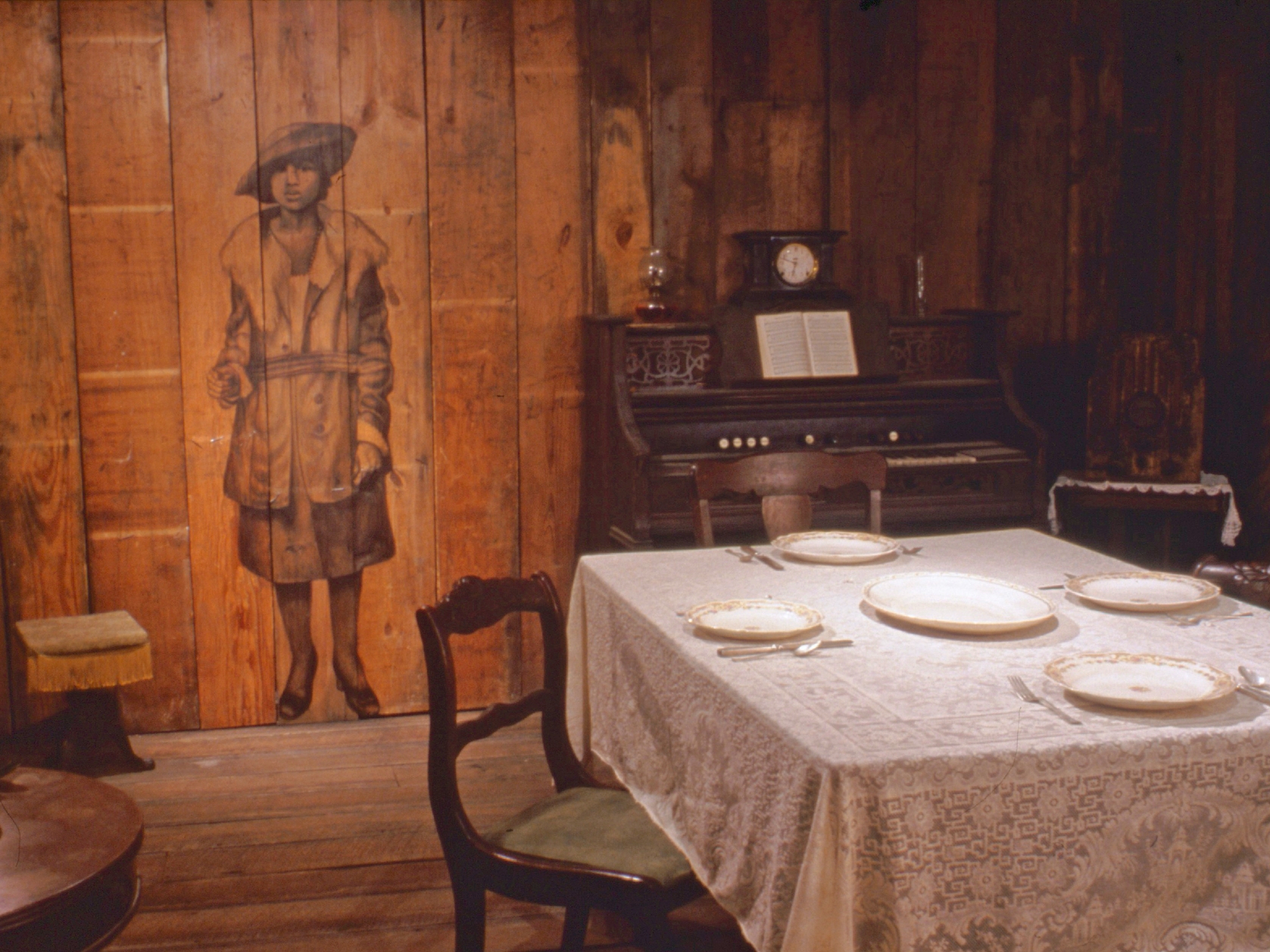 Photo of an art installation resembling a room in a Civil War era home.