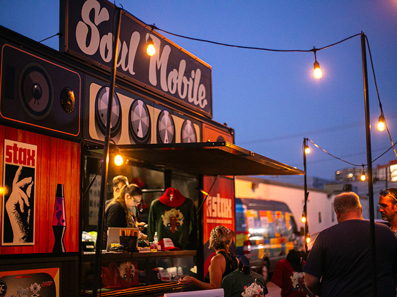 Photo of the Soul Mobile truck surrounded by people.