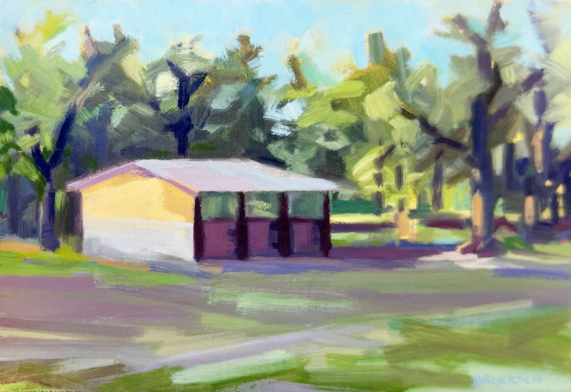 Photo of a landscape painting of a stable in a field next to a row of trees by Cindy Brucksch.