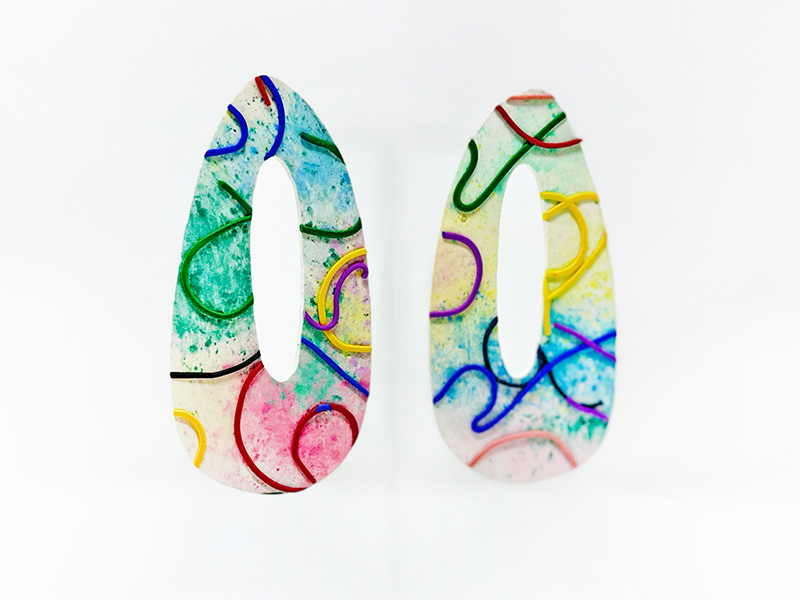Photo of a colorful set of polymer clay earrings.