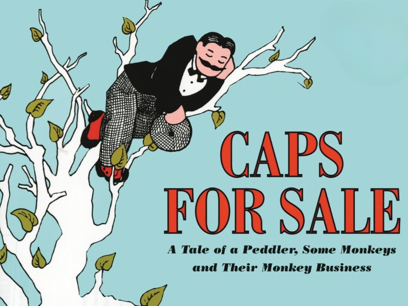 Illustration of a man in a suit and checkered pants napping on a tree branch. Bold text reads "Caps for Sale"